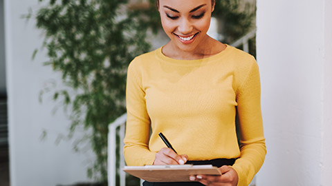 A childcare facility worker doing paperwork