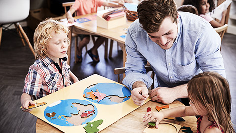 A person teaching kids in a daycare