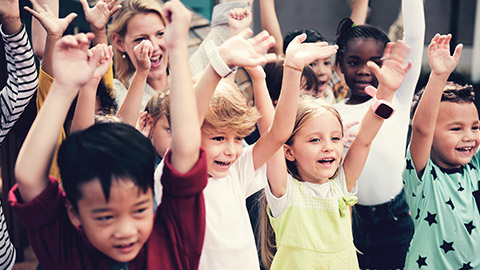 A diverse group of kids doing an activity