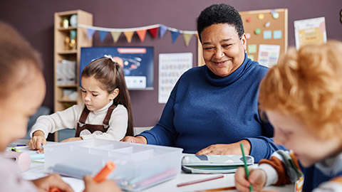 A teacher with a class of students