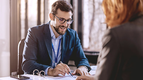 Man interviewing a woman