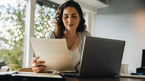 An accountant reading materials