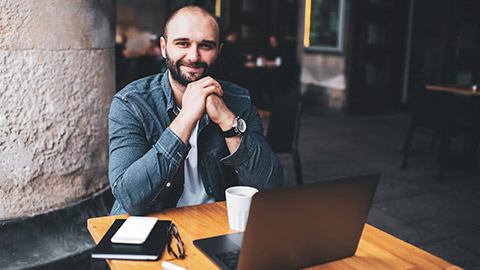 A freelancer working in an outdoor environment