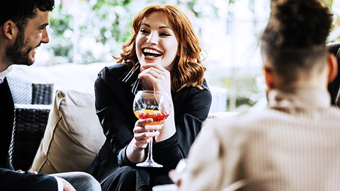 Woman laughing on meeting