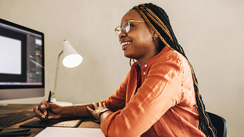 A designer working on a computer