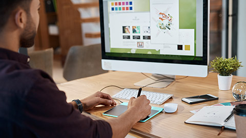 A designer working at a desk