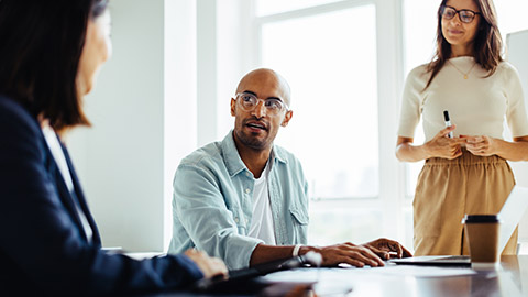 A diverse work group in discussion