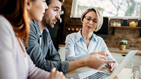 A small business owner talking to suppliers