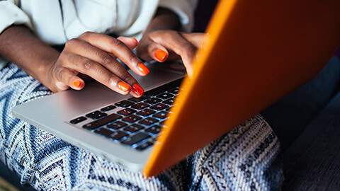 A close view of a person typing