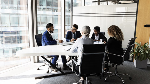 A person talking to stake holders