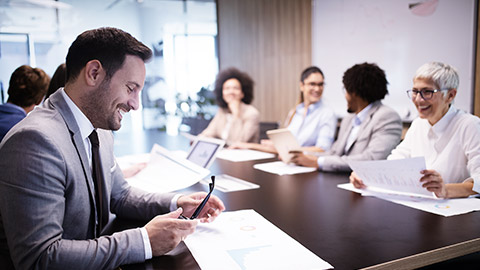 Happy businessmen on meeting