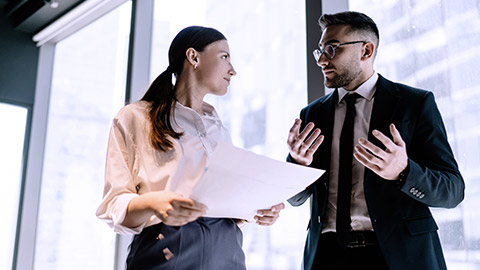 Man and woman on discussion