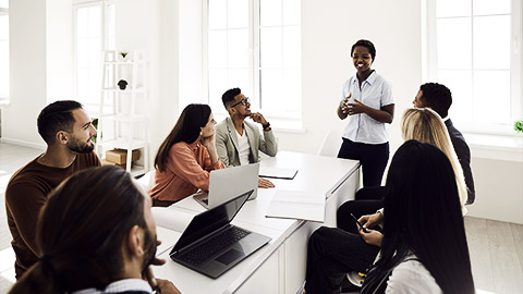 A manager talking to the team members