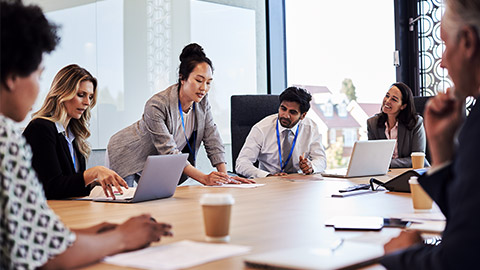 A chairperson taking lead in a meeting