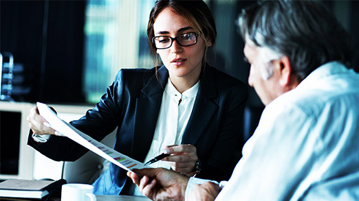 a lawyer discussing a case with a client