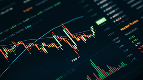 A close view of a candlestick chart, displaying the price of a volatile, financial market