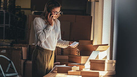 A busienss owner talking to a customer about a returned item