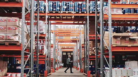 A wide shot of the interior of a warehouse