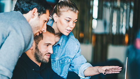 3 colleagues discussing tasks for a project