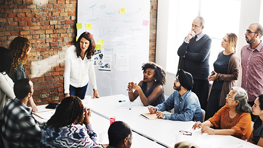 a leader taking point in a meeting