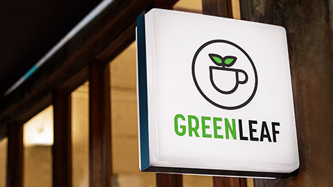 Close up of the GreenLeaf sign on the outside of the cafe