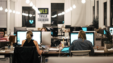 A wide shot of the interior of WLD TRVLR office