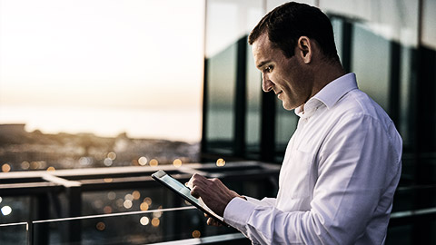 A person reading data on an tablet