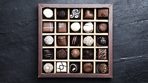 A box of chocolates with different shapes