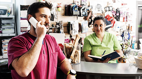 A veterinarian closing a client on the phone