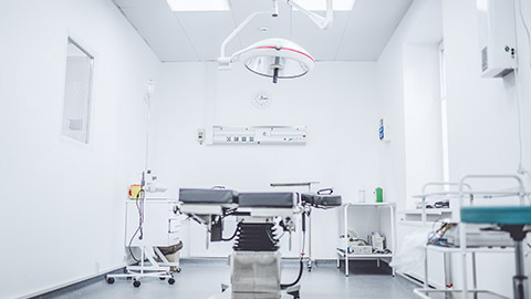 A wide shot of a clean and bright operating theatre at a vet clinic