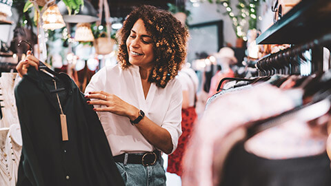 A shopper appears to have founda bargain and is happy about it