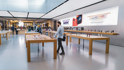 A wide shot of the inside of an Apple store