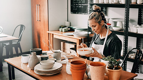 A small business owner working in their business space