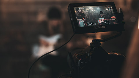 A close view of a video camera recording footage