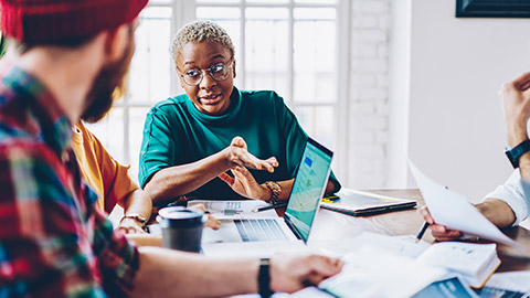 A team member giving feedback to a colleague