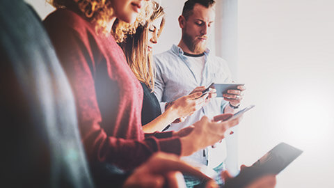 A group of users testing the UX of a new app