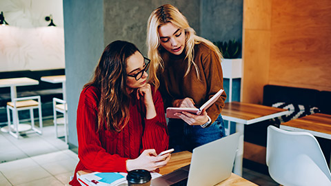 Two designers doing user testing on a project