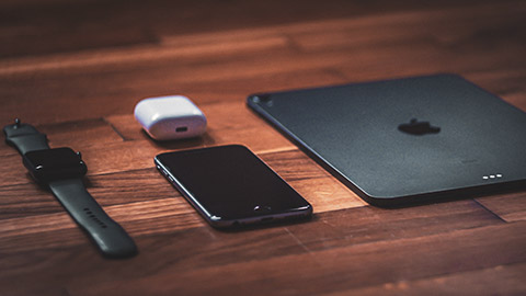 A flat lay of 3 mobile devices from Apple