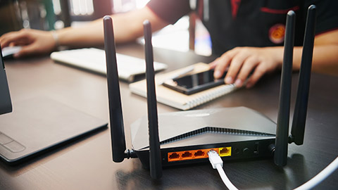 A rear view of a modem on a desk