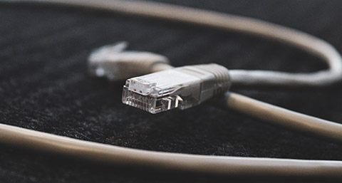 A computer cable on the carpet