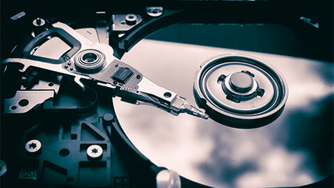 A close up of a functioning hard drive