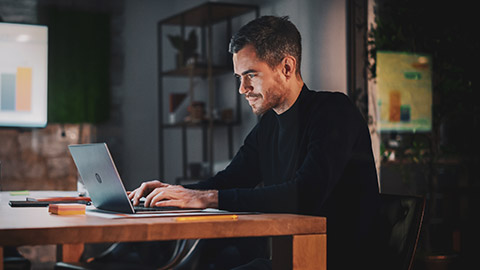 A programmer working on a project in an office