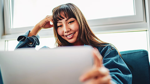 A user enjoying good UX on a website on a laptop