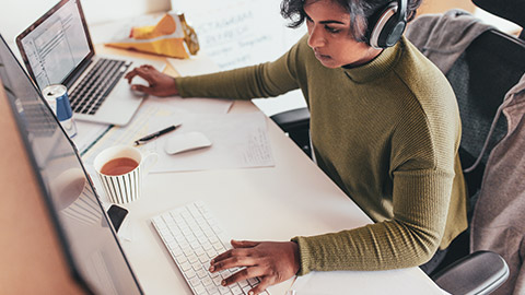 A prgrammer working on a project on multiple computers