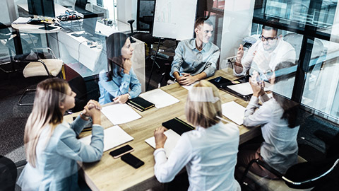 A group of people discussing a project