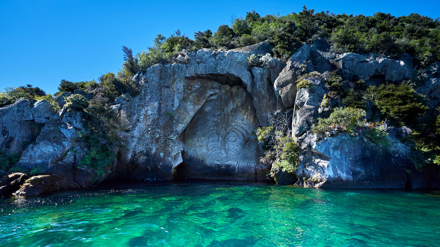 Ancient Maori Rock Painting and Carving