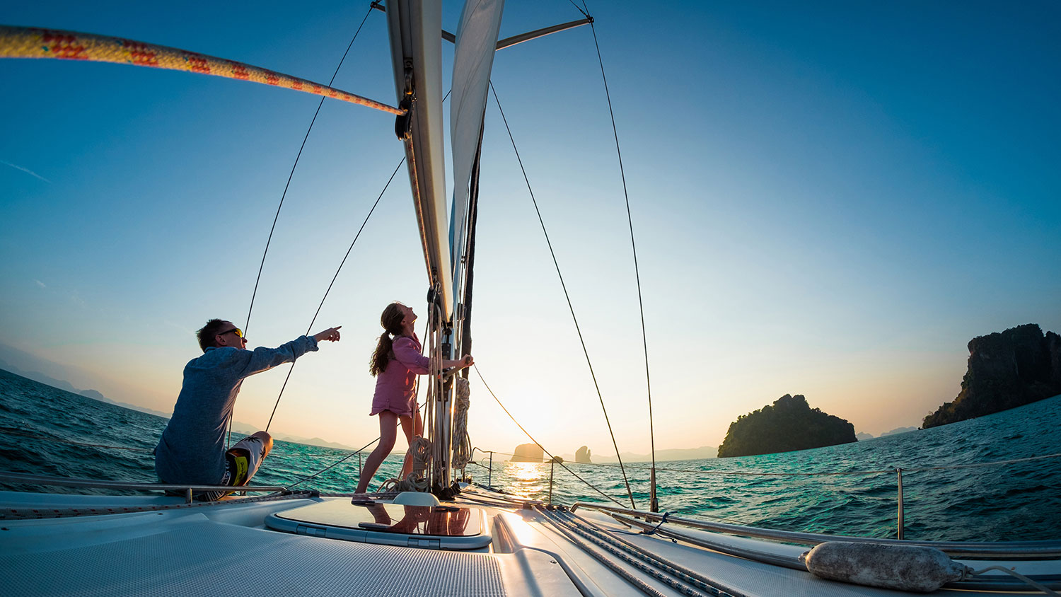 Couple sailing together in the tropical sea