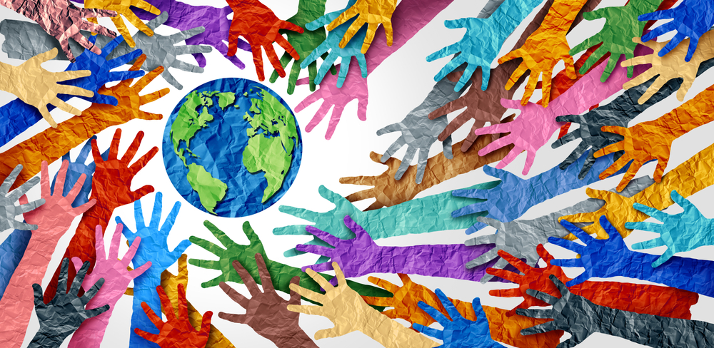 World diversity or earth day and international culture as a concept of diversity and crowd cooperation symbol as diverse hands holding together the planet earth