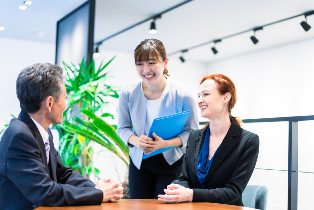 Interpreters and secretaries working in an office