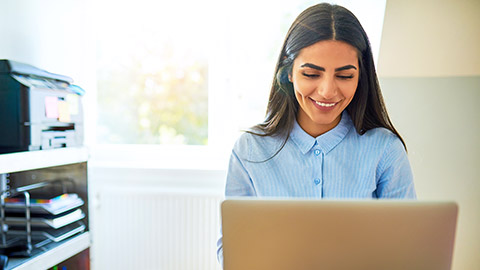 Young women working on a laptop computer